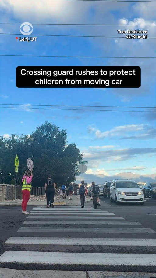 A crossing guard in Lehi, Utah, rushed in front of a vehicle as it began moving toward two children riding scooters through a crosswalk.

Video shows Tara Sandstrom holding up a stop sign before running toward the vehicle and shouting for the driver to stop. Sandstrom said her instinct was to protect the children and keep everyone safe.