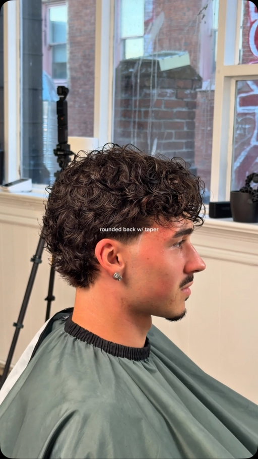 Show you barber and ask ⬇️ 

top: wavy middle part (2.5-3")
sides: low taper
back: natural finish rounded back (1")

#menshair #wavyhair #modernmullet #hairinspo