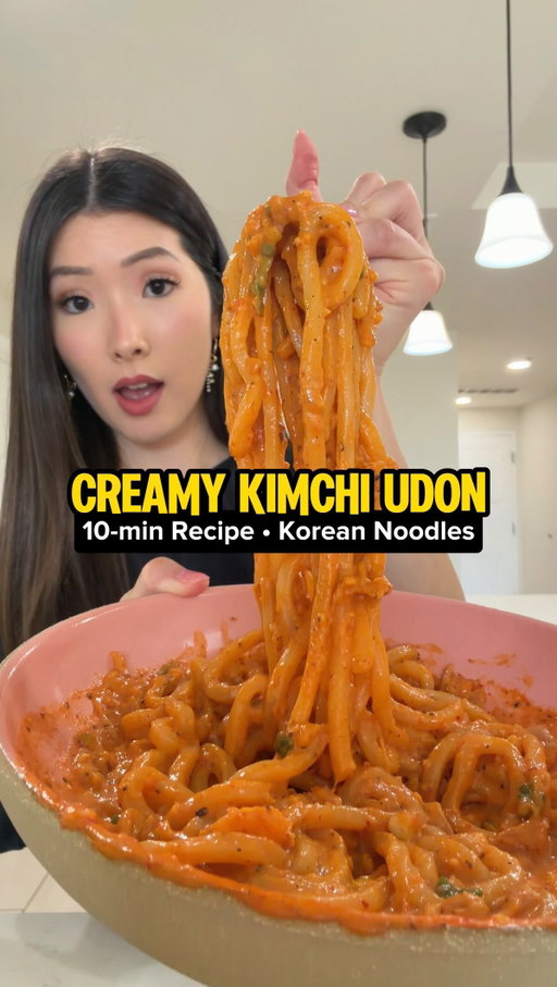 maybe my fave recipe of 2026!! kimchi gochujang udon noodles in 10 minutes! CREAMY AND SPICY AND SOOOO GOOD. It’s an easy one pan recipe that I like to have as a lazy girl dinner. Also if you’ve been to Louders in Ktown LA, this is kinda like a dupe of their kimchi carbonara udon dish - iykyk!!! 

INGREDIENTS (for 1 person): 
— 1 frozen udon packet 
— 2 tsp minced garlic
— 3/4 tbsp gochujang (Korean red pepper paste)
— 1/2 tsp gochugaru (Korean red pepper flakes)
— 1/4 tsp black pepper 
— 1/2 tbsp soy sauce 
— 1 tsp honey
— 1/3 cup chopped kimchi 
— 2 tbsp kimchi juice 
— 1/3 cup water 
— 6 tbsp heavy cream 
— grated parmesan to taste 
— chopped green onions to taste 

COOKING TIP: do NOT cook on high heat! Medium to medium high is best. Once you assemble everything in the pan, gently combine the ingredients together (except the noodles). And once you get to the final step of adding parmesan, black pepper and green onions, turn to LOW heat. 

PROTEIN SUGGESTION: beef or pork would complement this dish well! For instance, bits of pancetta or slices of beef brisket. 

#girldinner #easyrecipes #udon #kimchi #pastarecipe