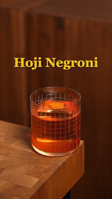 Hoji Negroni

For this one, I wanted to take the roasted, nutty character of hojicha and build a Negroni around it, rather than just infuse tea into a classic spec.

Japanese whisky gives the drink a softer, grain-driven base, while white crème de cacao reinforces hojicha’s chocolatey, toasted notes without making the drink read as a dessert cocktail. Sweet vermouth brings both richness and enough acidity to clarify the milk.

1 oz milk

1 oz Japanese whisky @suntorytoki 

1 oz sweet vermouth

.75 oz Campari @campariofficial 

.25 oz white crème de cacao @giffardusa 

2 g loose-leaf hojicha

Add the milk, Japanese whisky, white crème de cacao, Campari, and hojicha to a container and give everything a quick stir. Add the vermouth last. The acidity in the vermouth will immediately begin curdling the milk. Let the mixture infuse for 1 hour, then strain through an oil filter. The punch will run cloudy at first. Once a filter bed forms and the liquid begins running clear, pour the cloudy portion back through and continue filtering.

When you’re ready to serve, just pour it over a large block of ice and garnish with an orange coin.

#drinks #hojicha #mixology #negroni #cocktail