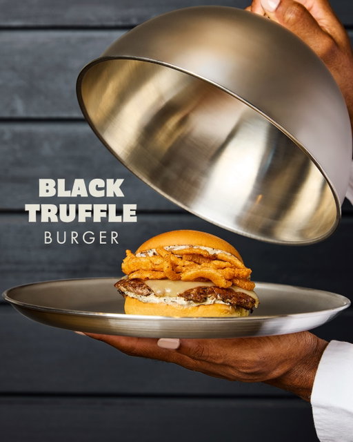 Worth the wait. Our Black Truffle Menu has returned! 

Black Truffle Burger
A made-to-order quarter-pound* of 100% Angus beef topped with Fontina cheese, black truffle sauce made with real black truffle oil, and crispy sweet onions on a toasted potato bun.
 
Black Truffle ‘Shroom Burger
Crisp-fried portobello mushroom filled with melted muenster and cheddar cheese, topped with black truffle sauce made with real black truffle oil and shredded lettuce on a toasted potato bun. 

Black Truffle Parmesan Fries
Crispy crinkle cuts dusted with parmesan cheese and served with black truffle sauce made with real black truffle oil
 
Now available in Shacks nationwide!