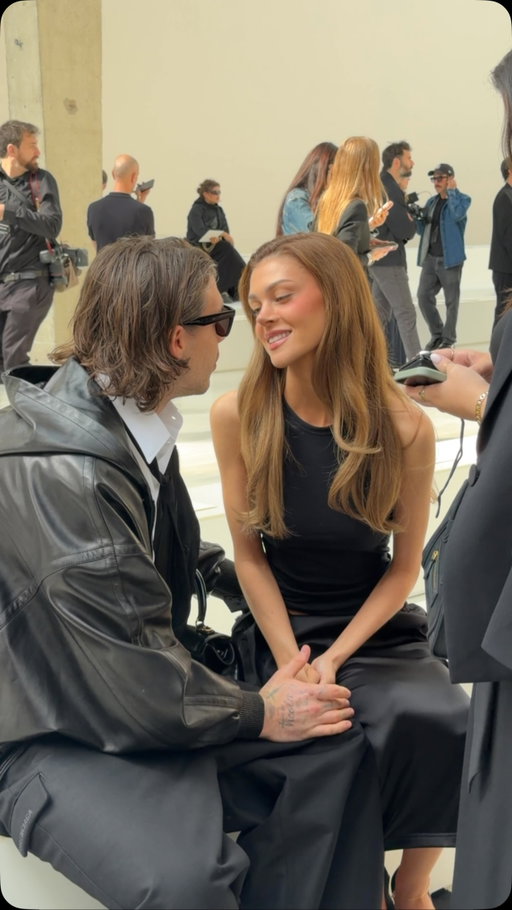 Love is in the air at @balenciaga! In a rare public appearance, @brooklynpeltzbeckham and @nicolapeltzbeckham sit front row at the brand’s summer 2027 show.