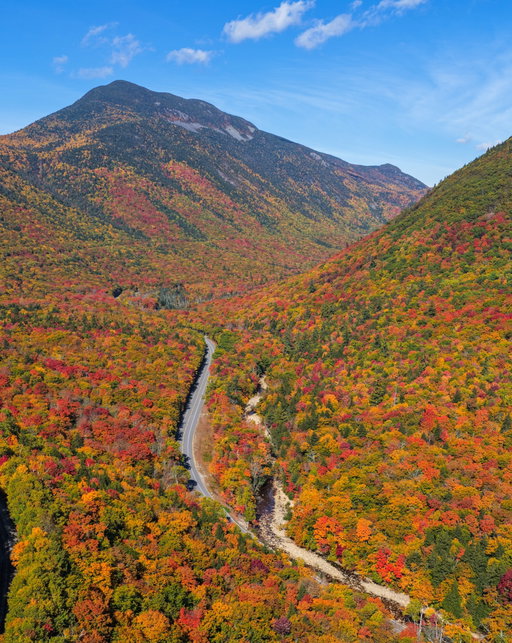 Today, 10.1.26, in New Hampshire 🍁🍁🍁 Peak color has arrived across the White Mountains and northern New England and it’s already being called one of the best foliage seasons in 10+ years 🍂👀 This weekend is shaping up to be ideal for leaf peeping in the White Mountains, Vermont’s Northeast Kingdom, and northern Maine, with full sun Saturday and crisp highs in the low 60s ☀️ Peak conditions should last about a week in the mountains, while the vibrant color keeps rolling south through central New England over the next 2-3 weeks before reaching Boston and the coast in early November 🍁

📍North Conway, NH by @samcdrones