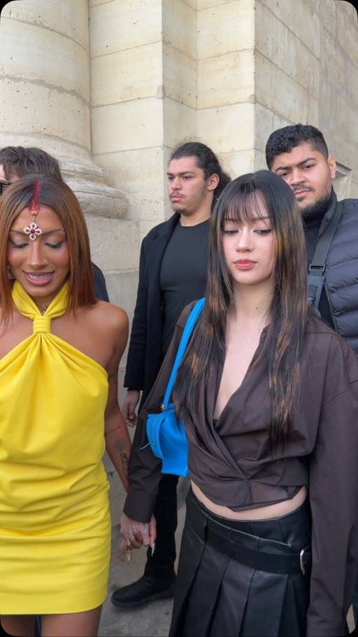 Bonjour, @katseyeworld! @lararaj and @meganskiendiel arrive hand in hand at @loewe’s spring/summer 2027 #ParisFashionWeek show.