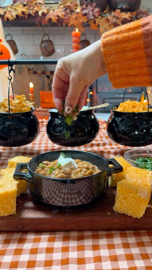 My favorite Halloween dinner! 🎃This easy 3-ingredient white chicken chili with @bushsbeans Chili Magic takes under 30 minutes, making it perfect for a busy night of costumes, candy and trick-or-treating. #BushsBeansPartner For a little extra Halloween magic, Bush’s partnered with a witch to cast a good-weather spell on a limited run of Chili Magic cans, with the hope of manifesting weather that’s just right for trick-or-treating. For the chili: 
🧙Bush’s Chili Magic
🧙Chopped onion
🧙Diced green chiles
🧙Cooked chicken

Here’s to Halloween on a Saturday, a convenient dinner and hopefully some good trick-or-treating weather! Get yours on bushsbeans.com, while supplies last.