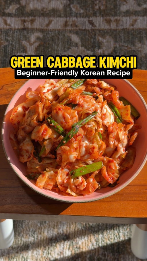 turn green cabbage into KIMCHI! this is a Korean recipe EVERYONE can make, even if you don’t have an Asian market near you! while traditional kimchi calls for napa cabbage, it’s not the most accessible ingredient for some people. This version is a quick and easy alternative that still offers the delicious crunch, tang and flavor of kimchi! It’s also beginner friendly and much less daunting as it calls for staple kitchen ingredients :) 

STORING TIP: Enjoy immediately (like geotjeori, or fresh kimchi) and eat within 3-4 days. OR let it ferment by leaving in a sealed container at room temperature for 1-2 days before refrigerating. 

BRINE TIP: If your head of cabbage is larger, you may need to use more salt. Use your best judgement. When chopping up the cabbage, I discard the very first layer of cabbage, the core, and the very thick parts of the cabbage. Those don’t make it into the bowl! Also, highly recommend giving your cabbage a nice toss half way through the 30 minutes for best results. 

Fun fact: green cabbage kimchi is called yangbaechu kimchi, and you’ll actually find it at some Korean-Chinese restaurants as a banchan (side dish)! 

INGREDIENTS & MEASUREMENTS: 
— 1 green cabbage (~3 lbs) 
— 1/4 cup coarse salt + 1 cup water (for brine) 
— 4-5 tbsp gochugaru (korean red chili flakes) 
— 2 tbsp minced garlic 
— 1 tbsp minced ginger 
— 2 tbsp fish sauce (OR saewoojeot) 
— 1 tbsp sugar (OR plum extract) 
— 1 bundle chopped green onions 
—OPTIONAL roasted sesame seeds to finish

#kimchi #cabbage #easyrecipes #koreanrecipe #banchan