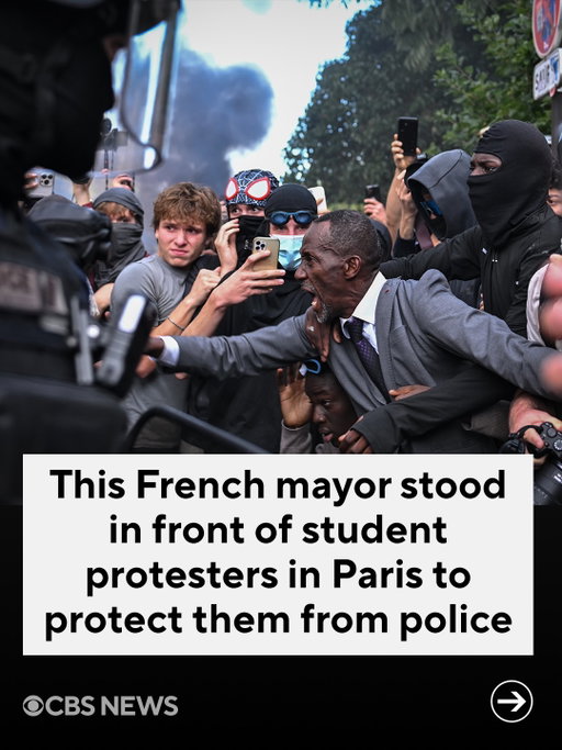 As thousands of student demonstrators gathered in Paris on Tuesday to demand that the government address underfunded and under-resourced schools, Saint-Denis Mayor Bally Bagayoko put himself between protesters and riot police in order to protect them.

Bagayoko was later seen being treated for tear gas exposure with eye drops.