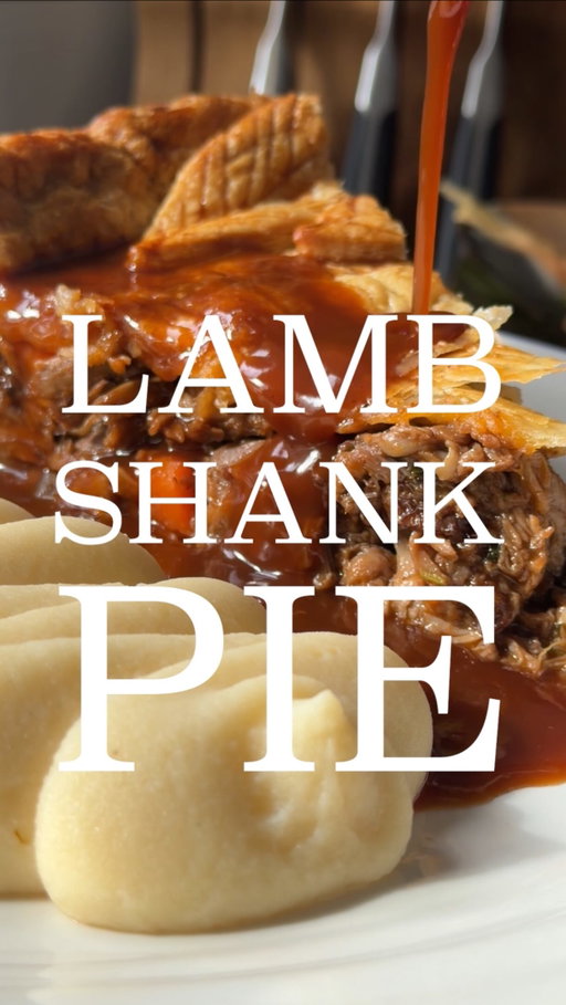 LAMB SHANK PIE 🥧 RECIPE ⬇️

@ed.cudlipp x @robertwelchuk AD

The ultimate autumn pie! Lamb shanks slowly braised in red wine, rosemary and thyme until falling apart, then shredded with golden mushrooms, carrots, fresh parsley and a rich red wine gravy. All encased in crisp shortcrust pastry with a deeply golden puff pastry lid.

I used the Robert Welch 316 Series Low Casserole to braise the lamb, the 316 Series Stainless Frying Pan for the vegetables and Robert Welch Professional Knives for all the prep. Full online recipe linked in my bio!

RECIPE (serves 6–8)

1. Season 4 lamb shanks generously with salt and pepper. Heat 2 tbsp olive oil in a casserole over medium-high heat and brown on all sides for 8–10 mins. Remove and set aside.
2. Add 2 diced onions, 2 diced carrots and 2 diced celery sticks. Cook for 8–10 mins, then add 2 tbsp tomato purée and cook for another 2 mins.
3. Pour in 500ml red wine and reduce by at least half. Add 750ml beef/lamb stock, 1 tbsp Worcestershire sauce, 1 tbsp redcurrant jelly, 1 halved garlic bulb, 3 rosemary sprigs, 6 thyme sprigs, 3 bay leaves and a handful of black peppercorns.
4. Return the lamb, cover and braise at 160°C fan for 3–3.5 hours until falling apart. Remove the lamb, then strain and reduce the braising liquid into a rich, glossy gravy.
5. Shred the lamb, reserving one clean bone. Fry 250g quartered chestnut mushrooms in butter until golden and blanch 2 chopped carrots until tender. Combine with the lamb, chopped flat-leaf parsley and enough gravy to generously coat. Reserve some gravy for serving and cool completely.
6. Line a deep 25cm pie tin with shortcrust pastry and blind bake at 190°C fan until lightly golden. Brush inside with egg wash and bake for another 2 mins to seal.
7. Add the cold filling, stand the reserved bone upright in the centre and cover with puff pastry. Crimp the edges, decorate, egg wash and chill for at least 20 mins.
8. Bake at 200°C fan for 20 mins, then reduce to 180°C fan for 40–50 mins until deeply golden and piping hot. Rest for 20 mins before slicing and serve with the reserved red wine gravy.

#lamb #pie #cooking #recipe #autumn