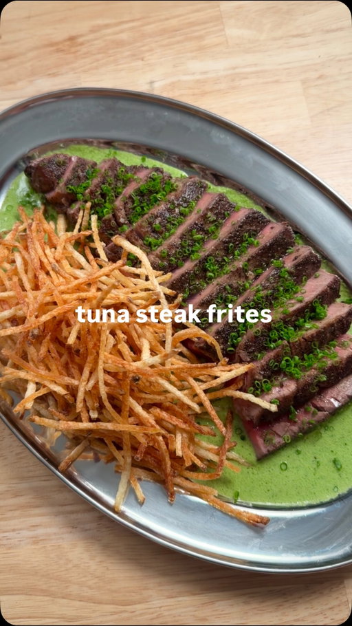How to Make Tuna Steak Frites 🐟🍟

INGREDIENTS: 
450g tuna steak - at least 1" thick
2 large russet potatoes 
1L neutral oil (for frying)
3/4 cup clarified butter (1 cup cold) 
2 tbsp cold butter 
2 cups parsley leaves
1/2 cup green onions, chopped 
1/2 cup tarragon leaves
1 large shallot
1 tbsp capers
3 anchovies (in oil)
1 tbsp white wine vinegar
1/4 cup white fish or chicken stock
8-10 dashes Worcestershire sauce
1 tbsp Dijon 
1 egg yolk
1.5 tbsp ground black pepper
Fine sea salt
Fleur de sel

INSTRUCTIONS: 
1. Clarify your butter. Thinly slice your shallot, and sauté it over low heat in 1-2 tsp of your clarified butter, until translucent. Add your capers and anchovies and continue to sauté to soften both. The anchovies should be able to break apart, and your shallots should be translucent. 
2. Add your sautéed shallots, capers and anchovies to a blender along with your Dijon, egg yolk, vinegar & Worcestershire. Add your fresh herbs & warm fish stock, and blend. Slowly add 2/3 of your clarified butter to the blender as it’s running. The sauce should have the consistency of a thin hollandaise. Transfer the sauce to a small pot to keep it warm, and gently stir in the remaining 1/3 of your clarified butter - you want the sauce to appear split! Season with salt to taste. 

RECIPE CONTINUES IN THE COMMENTS ⬇️

#tuna #steak #steakfrites #homecooking #recipe
