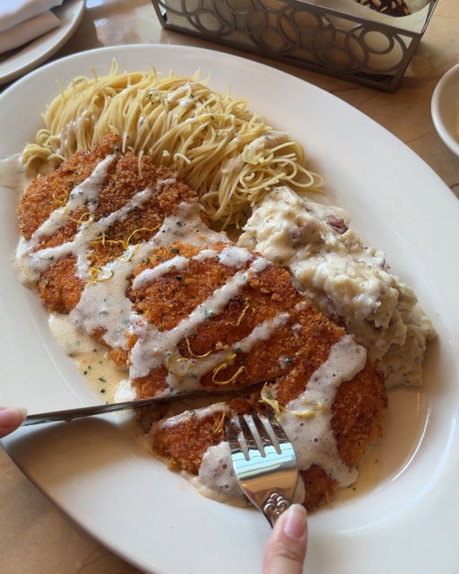 the crispy chicken costoletta hack is still living rent free in our heads (swap the asparagus for angel hair pasta and add extra sauce)