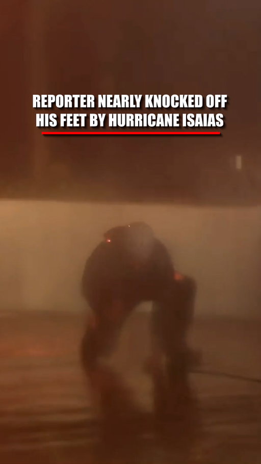 WATCH: @foxweather's @robertrayreports fights to stay on his feet as Hurricane Isaias' powerful winds slam Florida during landfall.