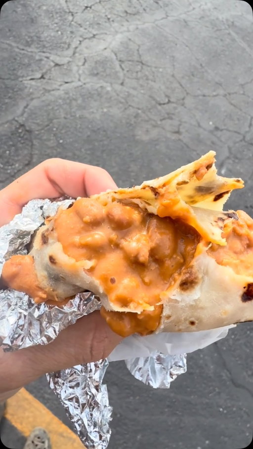Best bean and cheese burrito in Arizona? I’m listening to arguments, but this one’s gonna be tough to beat. 

Every time we head down to Rocky Point, there’s one stop the whole family looks forward to. The Chevron in Ajo, Arizona.

Yep. A gas station.

And every single time, we find ourselves sitting in the parking lot absolutely demolishing these bean and cheese burritos.

The tortilla has that beautiful char, cooked to perfection. Inside, it’s a gooey, cheesy, glorious blend of beans and melted cheese. And whatever you do, DO NOT skimp on the red sauce.

Nothing fancy. Just an absolutely dynamite burrito that has become a family road trip tradition.
I’m putting this up against just about any bean and cheese burrito in the entire state.

Next time you’re passing through Ajo, you know what to do.

Now tell me, who makes a better one? 👀
#AjoArizona #BeanAndCheeseBurrito #ArizonaFood #RockyPoint #WizardOfZa