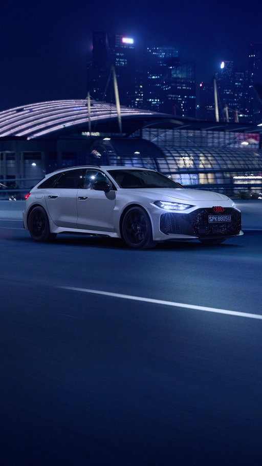 A bow to Singapore’s night sky. RS like never before. The Audi RS 5 in a color you can’t name. Inspired by Singapore’s transition from illuminated twilight to night sky this specific shade of Titanium Silver Grey gains depth and appears differently as the car moves through changing light conditions.⁣
⁣
It’s a celebration of Singapore’s rich culture and influences and the premiere of the Audi RS 5 in Asia.⁣
⁣
#Audi #WeRaceForProgress #RS5 #SingaporeGP⁣
-----⁣
Audi Revolut F1® Team. Powered by Audi⁣
Audi RS 5 Avant: Fuel consumption combined (weighted) in l/100 km: 4.5-3.9; Power consumption combined (weighted) in kWh/100km: 18.7-17.8; CO₂ emissions combined (weighted) in g/km: 102-88; CO₂ class combined (weighted): C-B; Fuel consumption with discharged battery in l/100 km: 10.2-9.6; CO₂ class with discharged battery: G.⁣
Special edition foiling is not available for purchase.​⁣
Closed course, professional driver. Do not attempt.