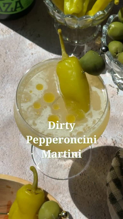 The dirtiest martini on your feed 🫒🍸

2 1/2 oz vodka or gin 
1/4 oz vermouth
1 1/2 oz olive brine
1/2 oz pepperoncini brine
Pepperoncini and an olive, for garnish
Olive oil, for drizzling

Shake with ice until cold, strain into a chilled coupe, garnish with a pepperoncini and an olive, drizzle with olive oil.

#dirtymartini #martini #pepperoncini