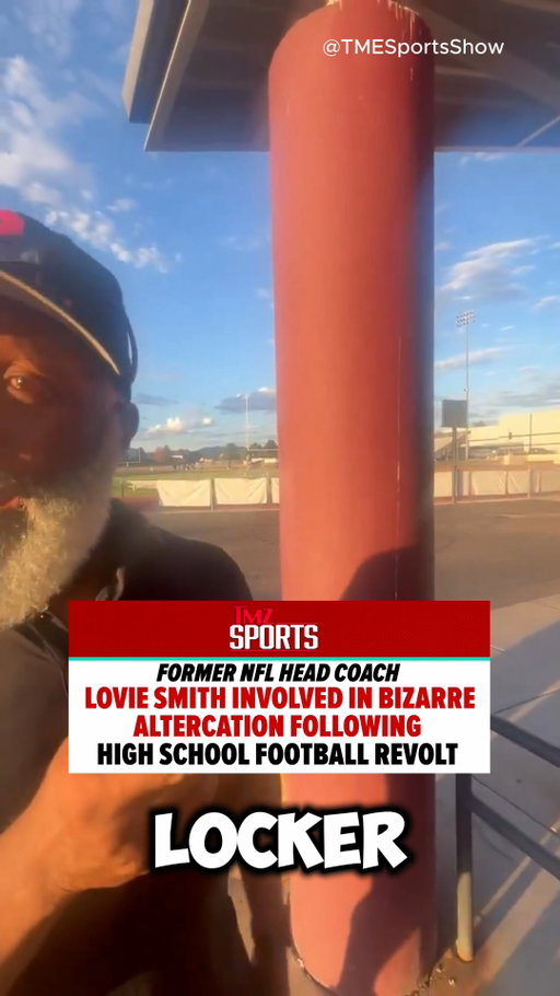 Former NFL head coach Lovie Smith was caught in a HEATED confrontation with parents at an Arizona high school football game! 😳 🏈 

The incident comes after his son, Miles, allegedly kicked the starting QB off the team, leading to 12 players being suspended after protesting the decision! 👀