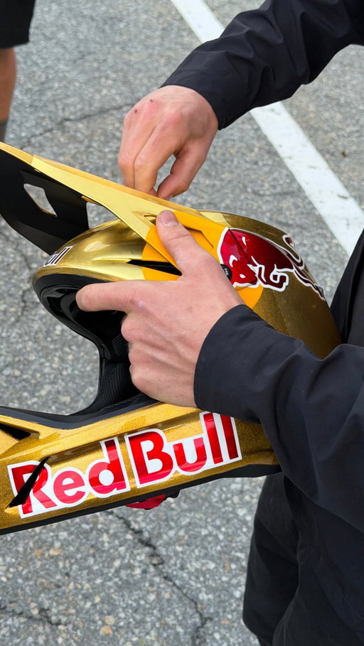 @brandonsemenuk presented @asavermette with a Gold Red Bull helmet to celebrate winning the World Cup overall title this year. Winning the overall title in your first year in elite’s is an incredible achievement 👑