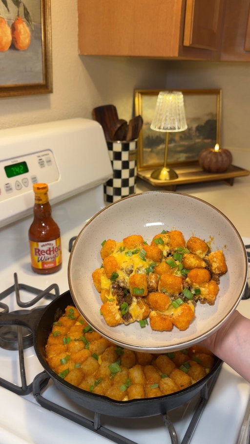 #ad Game day food doesn’t have to be complicated! I’m taking tater tot casserole up a notch with Frank’s RedHot Buffalo Wings Sauce for that signature buffalo flavor, mixed with BBQ sauce for a sweet and tangy twist. It’s a fun way to bring Frank’s into your next game day dinner and take that classic flavor way beyond wings! @franksredhot 

Sweet Heat BBQ Tater Tot Casserole

Ingredients:

1 lb ground beef
1 medium yellow onion, chopped
1 tablespoon minced garlic
1/4 cup Frank’s RedHot Buffalo Wings Sauce
1/2 cup barbecue sauce
8 ounces freshly grated sharp cheddar cheese
16 ounces frozen tater tots, or enough to cover the top
Sliced green onions, for garnish

Seasonings:

1/2 teaspoon salt
1/2 teaspoon black pepper
1 teaspoon onion powder

Directions:

Preheat the oven to 375°F.

Heat a skillet and brown the ground beef. Add the chopped onion and season with salt, black pepper, and onion powder. Drain any extra grease.

Add the minced garlic, barbecue sauce, and Frank’s RedHot Buffalo Wing Sauce. Stir to combine and let the mixture simmer on low for a few minutes.

Air fry the tater tots at 400°F for 12 minutes, shaking halfway through.

Top the beef mixture with the freshly grated sharp cheddar cheese, then arrange the prepared tater tots evenly over the top.

Bake at 375°F for 15 to 20 minutes, until the cheese is bubbly and the top is golden.

Garnish with sliced green onions before serving.

#FranksRedHotPartner #GameDayFood
