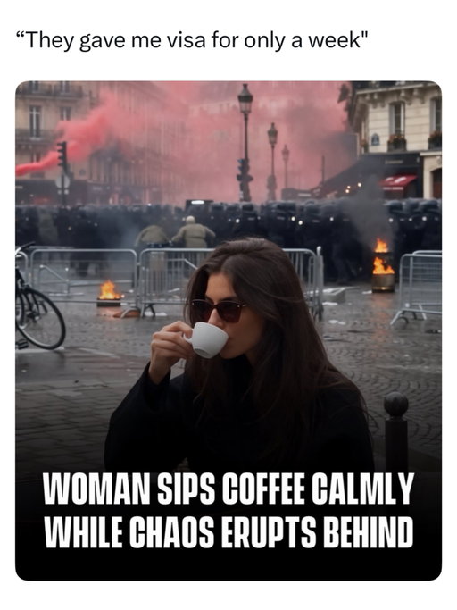 she tryna ignore it 😭😭😭

Paris just had one of its most turbulent protest days in decades, and this woman has a one-week visa and a mission: finish the espresso. Flares in the sky, riot police lined up behind her, barricades and bins on fire, and she still hasn’t turned around. Some people travel for the culture. She came for the coffee and nobody is taking that from her.

The protests were real. More than 550,000 people joined demonstrations across France on October 17, according to the Interior Ministry, and about 1,800 people were arrested. The café shot is a different story. It’s circulating as a real moment, but we couldn’t verify the woman or the scene, and it has the polished look of AI-generated imagery, so treat the vibes as real and the footage as unconfirmed.