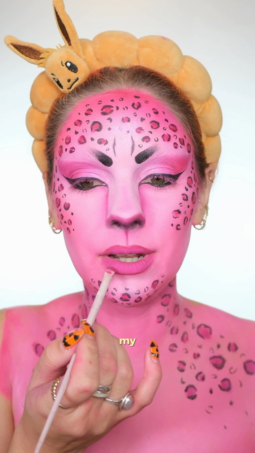 Come BTS with me! Now who wants the results? Pink leopard Halloween makeup 🩷 This turned out so cool (annoyed my lash lifted on the inner corner and I didn't spot it 🫠) It's giving Y2K 💁🏼‍♀️ 

Ib: @emilytembymakeup ✨ @azaramakeup 

products (ft pr gifting) 
@kryolanofficial supracolor grease paint + setting powder 
@plouise_makeup_academy am to pm palette 
@kaleidosmakeup space age highlighter 
@cheeryep_makeup precision eyeliner 
@anastasiabeverlyhills dramaline pencil
@nyxcosmetics_uk epic ink liner
@crazylensesnow contacts 
@tatti_lashes lashes 

#leopardmakeup #transition #halloweencostume #makeuptutorial #sophiehannahween