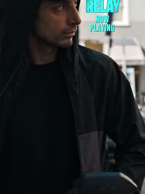 RELAY starring Riz Ahmed and Lily James is now playing in theatres.