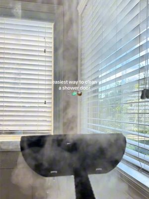 Easy way to clean a glass shower door 🚿🧼🫧 #steamcleaning #steamcleaner  #cleaninghacks #cleaninghacks #cleaningtips 