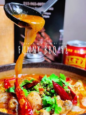 🔥 **Chinatown's Hidden Gem Alert!** 🔥 📍 Funny BBQ 98 📍 98 Bowery, New York, NY 10013 Funny BBQ 98 has been serving authentic Chinese BBQ and hotpot to New Yorkers for nearly a decade, creating countless memories in the heart of Chinatown! This legendary spot welcomes locals and travelers alike with their incredible all-day menu and amazing lunch specials. Known for their mind-blowing hot pot, irresistible Mala Tang, and smoky BBQ perfection, they're now dropping their NEW combo specials with 20%+ discounts! 🎉 Get your main + 10 BBQ skewers + drink combo and thank us later! 🙌 ✨ **MALA TANG COMBO** - Pure comfort in a bowl! That silky broth hits different with tender Chinese cabbage, chewy wood ear mushrooms, and bouncy fish cake. The spam adds that perfect salty punch! 🍜 ✨ **SPICY DRY POT COMBO** - Flavor explosion alert! 🌶️ Choose your protein adventure with succulent beef, melt-in-your-mouth lamb, or crispy pork belly dancing with aromatic spices and crunchy bean sprouts. The **BRAISED COMBOS** are insane! That fish melts like butter while the beef is fork-tender perfection. Fresh cucumbers and cauliflower balance those rich, savory flavors beautifully 🐟🥩 **FROG LEG COMBO** - Don't sleep on this! Surprisingly tender with a chicken-like texture, paired with crispy lotus root and bell peppers that soak up all those incredible spices! 🐸 🔥 **BBQ COMBO HEAVEN:**  - **MEAT LOVERS** - Those lamb skewers are UNREAL! Smoky, juicy, with that perfect char - **CHICKEN LOVERS** - Honey wings are sticky-sweet perfection, while spicy gizzards pack serious heat! - **VEGGIE LOVERS** - Even carnivores lose their minds over these! Lotus root gets crispy-creamy magic ✨ #ChineseFood #NYC #Chinatown #BBQ #HotPot