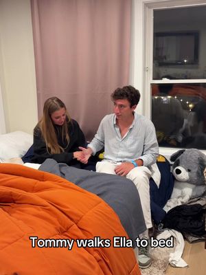 Tommy walks Ella to bed 