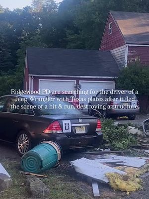 Developing👇 Ridgewood police are searching for the driver of an electric Jeep Wrangler with Texas plates who fled the scene after a hit-and-run crash early Sunday, Aug. 31. The vehicle struck and completely destroyed a small structure on East Glen Avenue near the Route 17 northbound ramps. The building, believed to have historic value, sat on the same property as a historic house and barn. Authorities said the Jeep was found heavily damaged and abandoned less than a tenth of a mile away on Ridgewood Water property. A K9 unit from the Bergen County Sheriff’s Office, an Oradell police drone, and a New Jersey State Police helicopter were deployed to track the suspect, but the driver remains at large. Multiple police agencies assisted Ridgewood officers in setting up a search perimeter, while Ridgewood firefighters responded to secure the collapsed structure and address fire hazards. The investigation remains ongoing. - Follow for more #local news in NJ📍 🎥 @boydaloving  #bergencounty #bergencountynj #ridgewoodnj #njnews   