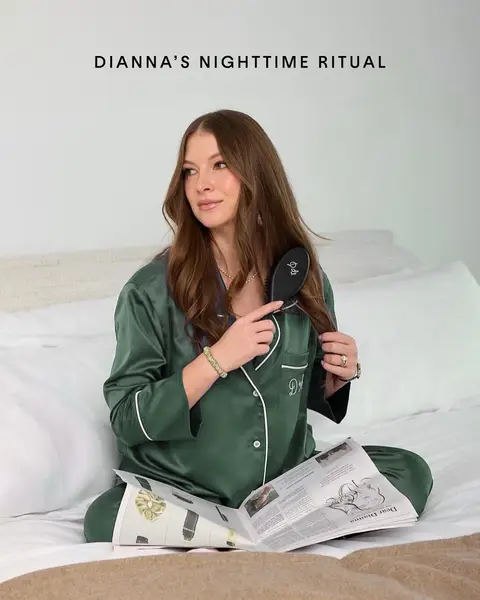 She begins brushing her strands with the Mini Brush No. 001, followed by a few drops of the new Overnight Repair Serum. She calls it her “princess hair serum.” Then, she tucks herself in and ends her day on a cloud: resting her fine fibers on 100% silk. 