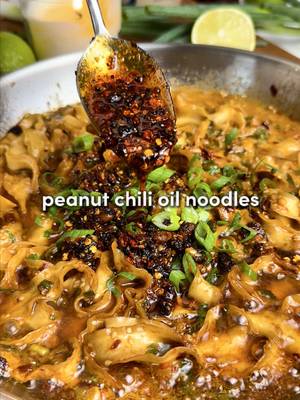 5-Minute Peanut Chili Noodles 🔥 As simple as it gets, as flavorful as it gets:  sweet, savory, and just the right spice. Protein tip: Best served with chicken, shrimp, or tofu 🫡 Ingredients: -9 oz (250 g) hand-cut thick noodles (or any noodles you like) -1.5 tbsp peanut butter -1 tsp chili flakes (optional) -1/3 cup fresh green onion, sliced -2 tsp sesame seeds -5 garlic cloves, minced -1 tbsp white sugar (optional, but balances the heat) -1 tbsp chili crisp (+ 2 more tbsp extra for garnish)  -1 tbsp rice vinegar -2 tbsp dark soy sauce -1/3 cup neutral oil (I use avocado) -3 tbsp reserved pasta water (optional) -More sliced green onion, for garnish -Fresh lime wedges, for garnish I recommend “Lao Gan Ma Spicy Chili Crisp” Instructions: 1. Bring a  pot of salted water to a boil and cook your noodles according to package instructions. Undercook them by about 30 seconds because they’ll finish in the sauce. Save some pasta water (!!), then drain and rinse the noodles under cold water so they don’t stick together like clingy exes. 2. In a cold pan (no heat yet), add: peanut butter, chili flakes, green onion, sesame seeds, garlic, sugar, 1 tbsp chili crisp, rice vinegar, and dark soy sauce. 3. Heat 1/3 cup neutral oil until it’s really hot (like “sizzle your eyebrows off” hot), then carefully pour it over the cold ingredients in the pan. Watch the magic happen. Stir it all together. 4. Toss in your noodles and coat them in the sauce. If you want them extra silky, turn on the heat to medium-low, splash in 2–3 tbsp of the reserved noodle water and thoroughly mix together. 5. Turn off the heat, top with more green onion, extra chili crisp, and lime wedges if you’re fancy. #Recipe #DinnerIdeas #dinner #cooking #recipesoftiktok #noodles 