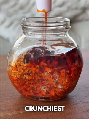 Not me spending only $1.50 for this jar of chili crisp 🤭💰 ✨ TIPS ✨ Ingredient Reccos: - You can find fried garlic and fried onions at any Asian supermarket (usually about $1 USD/$1.50 CAD) per small bag - My fav affordable (and widely available) chili oil brand is Laoganma Spicy Chili Crisp #notsponsored - This chili crisp is only around $3.50 USD/$5 CAD  Steps: - To ensure OPTIMAL CRISPINESS, toast the fried garlic and fried onion in a dry pan on low heat for 30 seconds to make sure it's super dry and there is no moisture AT ALL - Wait until it cools, then transfer to a dry clear jar - ratio should be 60% fried garlic and onion, 40% chili oil  - mix until combined - store in fridge and ideally use within 2-3 weeks #chilicrisp #EasyRecipe #foodhack