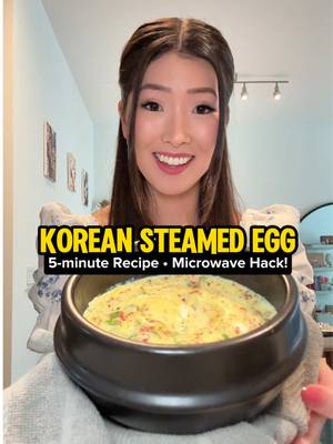 Yes you can make Korean steamed egg in the MICROWAVE!!! I like to call it a Korean mom hack because I learned it from my mom when she wanted to focus on lazy yet hearty, delicious cooking! You don’t have to wait until your next korean barbecue dinner to eat gyeran jjim because this high protein, low carb recipe works for anyone - even those of you in college who might not have a full kitchen.  This recipe serves 4 people as a banchan (side dish) or 1 person as a meal. Highly recommend serving with rice!  MEASUREMENTS:  — 4 eggs  — 100 mL water  — 1/2 tsp fish sauce  — 1/4 tsp beef dasida (beef, chicken or veggie stock is OK!)  — 1/4 tsp kosher salt  — black pepper to taste  — chopped green onion to taste  — sesame seeds to taste  — gochugaru to taste  Feel free to top your gyeran jjim with a dash of sesame oil at the end.  #koreanrecipe #koreanfood #steamedegg #gyeranjjim #kbbq #microwave #EasyRecipe #banchan #lunchideas 