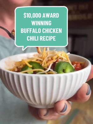 The best buffalo chicken chili recipe! Ingredients * 1 tablespoon olive oil * 2 pounds boneless, skinless chicken breasts * 2 large carrots * 3 stalks celery * 1 large red pepper * 5 cloves of garlic * 5 tablespoons of chili powder * 2 tablespoons ground cumin * 1 tablespoon paprika * 1/2 cup Frank’s Hot Sauce * 2 (15 oz) cans tomato sauce * 1 (15 oz) diced tomatoes * 1 (15 oz) black beans, drained * 1 (15 oz) chili beans in sauce (do not drain) * salt and pepper to taste Instructions Put chicken breasts in food processor to grind up – if you can find ground chicken breast, you can use that too.  Heat oil and add ground chicken and cook about 10 minutes on medium heat until no longer pink.  Rinse out processor and add carrots, celery, garlic and red pepper and puree.  Add to chicken mixture and cook about 5 minutes until veggies start to soften. Next add the rest of the ingredients, put stove on simmer and cook for 1 hour. Notes On my WW plan, each 1.5 cup is 2 WW points. Per 1.5 cup serving: 247 calories, 5 fat, 25 carbs, 9 fiber, 26 protein.