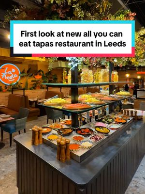 Leeds’ first “all you can eat” tapas restaurant opens this week! 😋 La Fiesta brings ‘unlimited’ Mediterranean flavours to the city - for less than £30 per person (and children under 5 eat free!).  It all begins at the huge starters bar in the middle - with Spanish snacks, Italian cheeses, charcuterie, artisan breads and salads. 🧀🥓🥗 Then comes the main event - with an initial three tapas dishes ordered per person from a huge menu of seafood, grilled meats and other Mediterranean favourites 🇪🇸 🇮🇹 🇹🇷 🇬🇷 You can then order more at two dishes at a time 🙌 To finish, there’s even a churros station complete with chocolate fountain! 🍫 It looks pretty snazzy inside too 🤩 Check them out at the Merrion Centre from Friday! #leeds #leedscitycentre #leedsfood #leedsfoodie #tapas @themerrioncentre  