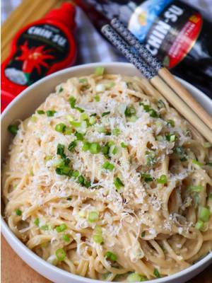 creamy umami garlic noodles 🍜🧄✨  this is my creamy twist on vietnamese garlic noodles- buttery, garlicky, cheesy, and full of umami flavor with a little kick from @@Chinsu_Hot_Sauce chili sauce!  ingredients: 12 oz spaghetti 4 tbsp butter 10 garlic cloves, minced 1 tbsp oyster sauce 1 tbsp chin-su fish sauce 1 tbsp brown sugar 1 tbsp chin-su chili sauce 1 cup parmesan cheese, grated 1/2 cup heavy cream 1/3 cup pasta water (more if needed) 1/4 cup green onions, sliced extra parmesan + green onions for garnish directions: cook spaghetti until al dente, saving some pasta water. melt butter in a pan and sauté garlic over medium-low heat until fragrant. stir in oyster sauce, fish sauce, brown sugar + chin-su chili sauce. let simmer for 2–3 mins. add pasta to the pan along with parmesan, heavy cream + pasta water. toss until the sauce emulsifies and coats the noodles. add more pasta water if too thick. stir in green onions, then top with more parmesan + green onions to serve. #chinsu #garlicnoodles #pasta #pasta #vietnamesefood 