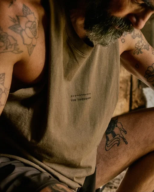 Ten Thousand’s second collaboration with accomplished designer and creative tastemaker Aaron Levine pushes the boundaries of performance and style. Aaron’s idiosyncratic aesthetic and dedication to constant improvement manifests through a hand-selected palette that sees @tenthousand.cc best-selling training staples reimagined in muted earth tones and vibrant pops of color. Built on a shared philosophy of discipline and control, this is a collection with no noise and no excess — just gear that reflects commitment to growth and a refined sense of style. Featuring the rugged Tactical Short and made in USA Garment-Dyed Logo Tee, these ultra-limited pieces are ready for anything you can dream up. Gear up now at the link in bio.