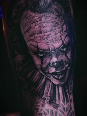 Pennywise comes to life in ink 😱🎈Realistic horror tattoo by Leandro at 📍 Rock and Roll Tattoo Studio #pennywisetattoo #horrortattoo #realistictattoo #tattooart #tattootiktok🔥🔥 