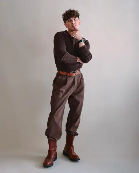 guys with a sweet tooth to the front of the line plz 😏🤎 this lil nerd was swimming in chocolate tones today. 🫰🏼 Do we like the fit? — wearing: @GU USA pants + @ZARA knit top + @Levi’s belt + @Wolverine Boots & Apparel boots + @SamsungUS #GalaxyWatch8Classic + @LucasPlus jewelry #OOTD #nyc #mensfashion #mensstyle 