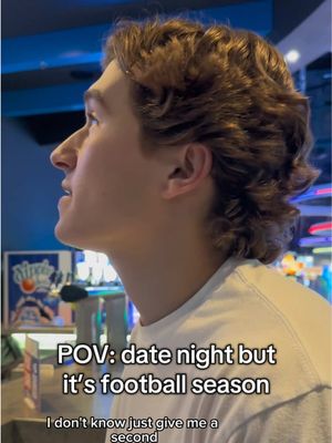 More invested in the game than her games.  @Dave & Buster's #daveandbusters #dating #football
