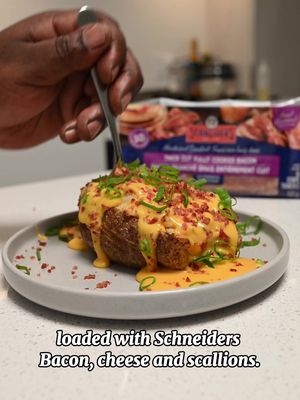 Twice Baked Potatoes Loaded with Schneiders Bacon, Cheese & Scallions. Golden, cheesy, and loaded with flavour — these twice-baked potatoes are taken to the next level with Schneiders Bacon. 🥓🇨🇦 Proudly owned in Canada and made in Manitoba, Schneiders has stayed true to their craft for generations, bringing the bacon-iest bacon to households across the country. It’s the easiest, fastest way to add rich, smoky flavour to your favourite dishes — because let’s be real, bacon goes with just about everything. Ingredients • Russet potatoes (large, baking type) • Olive oil • Kosher salt & black pepper • Sour cream • Butter • Schneiders pre-cooked bacon, chopped • Scallions, thinly sliced • Shredded cheese (cheddar or a sharp blend) • Cheese sauce (for topping) Method 1. Bake the potatoes: • Prick with a fork, rub with olive oil, season with salt. • Roast at 350–375°F for 1 hour, until skins are crisp and centers tender. 2. Make the filling: • Slice potatoes open lengthwise, scoop out the insides into a bowl. • Mix with sour cream, butter, cheese, chopped Schneiders bacon, and scallions. • Season to taste. 3. Fill & bake again: • Spoon the mixture back into the potato shells. • Return to the oven until hot and lightly golden, about 15 minutes. 4. Finish strong: • Drizzle with warm cheese sauce. • Top with more Schneiders bacon and scallions. • Serve hot. @Schneiders  #ad #Schneiders #SchneidersBacon