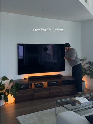 Upgrading my tv setup. What do you think? Decided to switch over to a tv with less glare for the living room area and landed on the Samsung Frame Pro. So far it looks great, but I’ll definitely miss my Philips hue lights behind the tv. #interiordesign #tvsetup #interiordecor #asmr #samsungframepro     