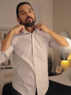 ⚠️Metals at the Neck, Just in Case.👇🏽 Description Outfit:  - White and grey striped Oxford shirt, worn untucked for a relaxed yet refined touch. - Straight cut black denim jeans. - Polished black leather boots, adding elegance with every step. - An elegant fragrance, impossible to ignore. - A vintage Omega watch from the 70s, timeless sophistication. - Purple Merino wool sweater, warmth and bold character in one piece. #grwm #asmr #modamasculina #mensfashion 