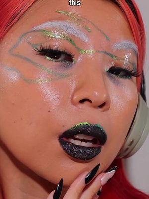 Trying this make up doodle for fun ✍️ What do you think?  inspo @Kaleidos Makeup /燒白白 on rednote Make up  Kaleidos glow melt on eyeliner- limelight* @odenseyecosmetics winter Alva palette* @about-face beauty eye gloss*  @Queencosmetics liquid lipstick- about dark* @THEUNSEEN algae black liner*  *gifted w no obligation  #creativemakeup #funkymakeup #funmakeup 