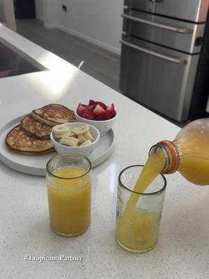 Between breakfast and getting the girls ready for school we love to enjoy our mornings with a glass of @Tropicana it just makes breakfast feel complete 🍊✨ #TropicanaPartner 