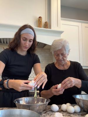 Back in the kitchen with Yiayia Maria 🤍🇬🇷 Greek Walnut Cake - Karidopita Recipe: • 10 room temperature eggs ( separate yolk & egg)  • 10 spoonfuls of white sugar  • Fluff egg white & then fluff yolk with sugar  Mixture :  • Walnuts (as many as you want) • 2 spoonfuls baking powder  • 1 spoon cinnamon  • 1/2 spoon of ground clove  Mix all together and put in oven 350 for 30-40 min Sugar Mixture: • 2 cups melted sugar • 1 lemon slice  • 1 cinnamon stick Once out of oven, pour mixture and let cool. Store in fridge 🍴 #greekrecipe #cookingwithmaria #cooking #Recipe #greek #content #creator #daily #minivlog #Vlog #food #Foodie
