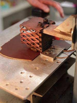 Stamping the Red Wing legacy into each boot.