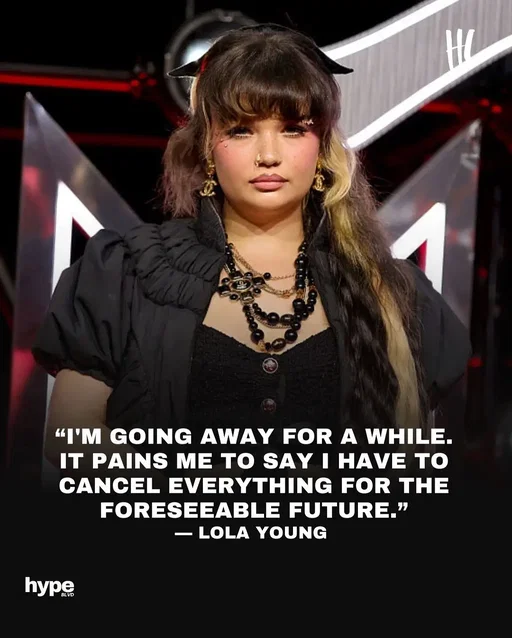 Lola Young announced on social media that she will be taking a break and canceling upcoming shows, sharing in her statement, “I really hope you’ll give me a second chance once I’ve had some time to work on myself and come back stronger.” (📸: Getty Images)