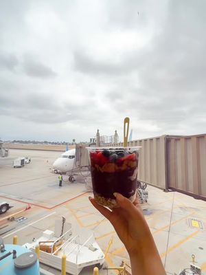 Your favorite airport meal unlocked! ✈️ Be sure to grab a delicious, handcrafted SAMBAZON Açaí Bowl at John Wayne Airport (SNA)! #SAMBAZON #SAMBAZONAçaíBowls #SNA #JohnWayneAirport 