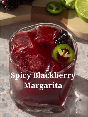 Simple and Spicy  5 blackberries  2 slices jalapeno  .75 oz lime  .5 oz agave .5 oz orange liqueur  1.5 oz tequila  In a cocktail shaker, combine blackberries, jalapeño, lime juice, and agave. Muddle to release all the juice from the blackberries. Add the orange liqueur, tequila, and ice, and shake until the mixture is cold. Strain into a cocktail glass full of ice and garnish with a blackberry and jalapeño slice.  #cocktailrecipes #EasyRecipes #cocktail #drinksathome #blackberry #jalapeños #margarita #margaritarecipe 