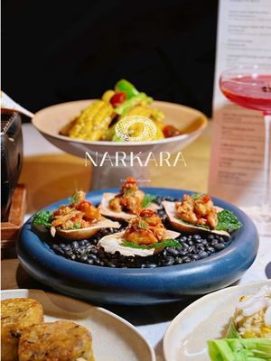 🇹🇭 Just Discovered Manhattan’s Hidden Thai Gem ✨ 📍Narkara 📍5 E 17th St, New York, NY 10003 Stumbled upon Narkara on E 17th St and WOW — this place is giving everything! 😍 From the moment you walk in, the excellent vibe brings me from Manhattan to Thailand. What We Devoured: 🍽️ 🌽 Sweet Corn Salad Two Ways- citrusy perfection meets coconut tamale dreams   🍗 Stuffed Chicken Wings- boneless, sticky rice-filled, GOLDEN crispy   🦀 Crab Butter Custard with Uni- this silken luxury on grilled sticky rice is *chef’s kiss*   🌶️ Thai Sausage Platter- Sai Ua & Sai Krok Isan with that bold fermented fish dip hit different   🐟 Roasted Seabass in Banana Leaf- smoky, fragrant, herbaceous   🥩 NY Strip with Sticky Rice Waffle- didn’t know I needed this combo until NOW The Short Rib Spicy Herb Souphad us sweating (in the best way) 🔥 and that Steamed Egg Custard with betel leaf? So delicate and aromatic 💚 The Vibe: Northern & Northeastern Thai authenticity meets modern elegance. Every dish is made in-house with SO much care. You can taste the generations of culinary wisdom in every bite 🙏 ✨ #NarkaraNYC #ThaiFood #ManhattanEats #FoodieFinds #NYCRestaurants​​​​​​​​​​​​​​​​